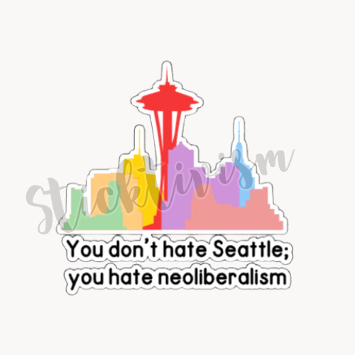 Seattle skyline with the Space Needle in the center, black text below reads "You don't hate Seattle; you hate neoliberalism"